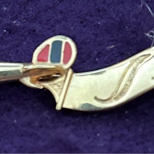 Elegant Goldtone and Red Savvy designer, jewelry, pin marked